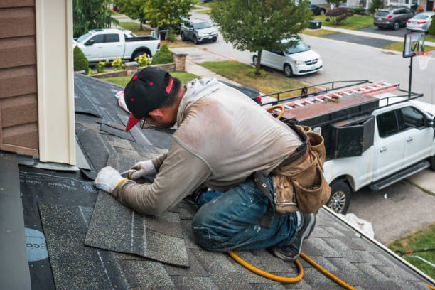 Professional Roofing technician working in Fisher, IL